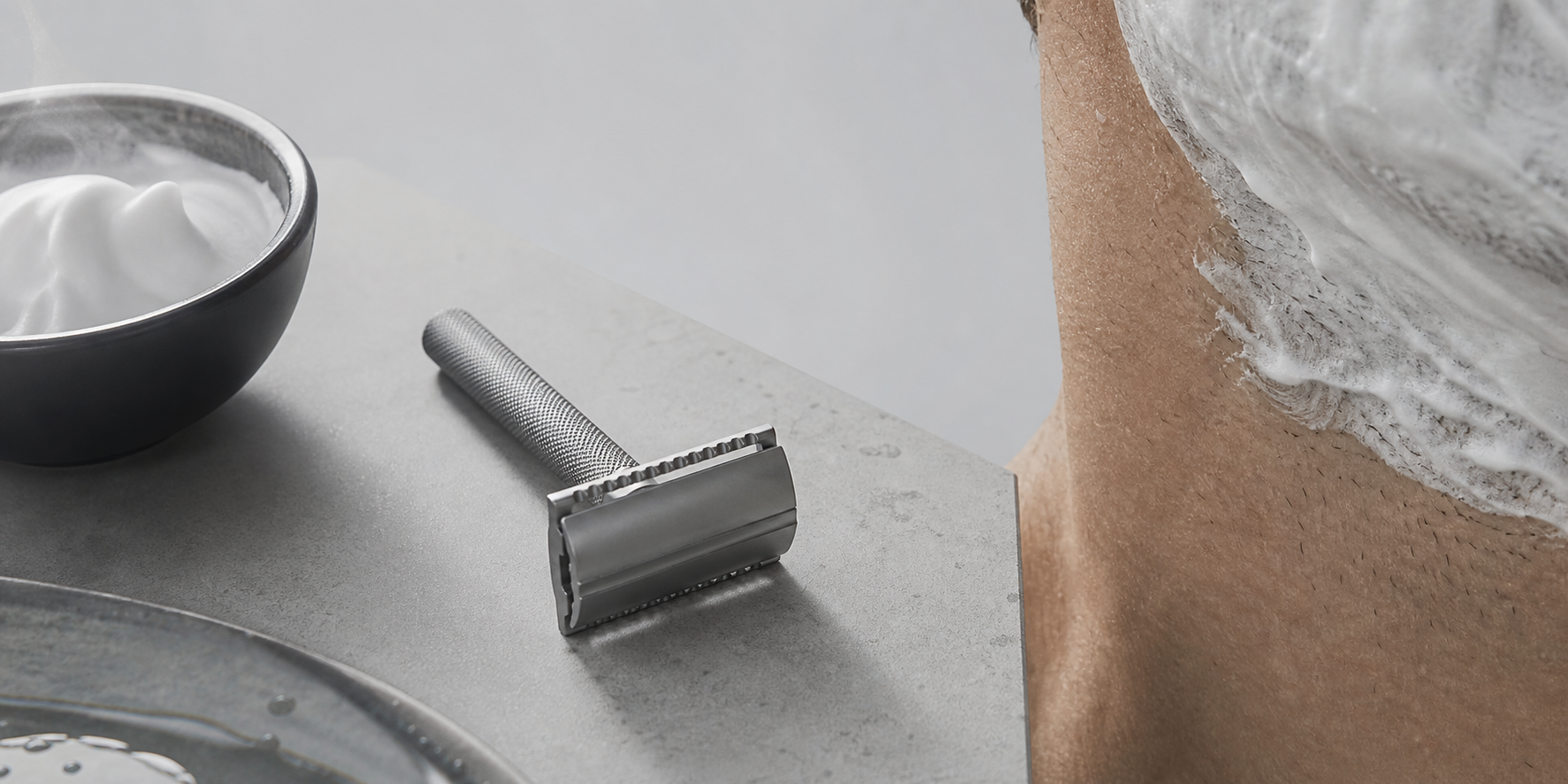 Shaving foam texture, razor detail, and cropped skin texture